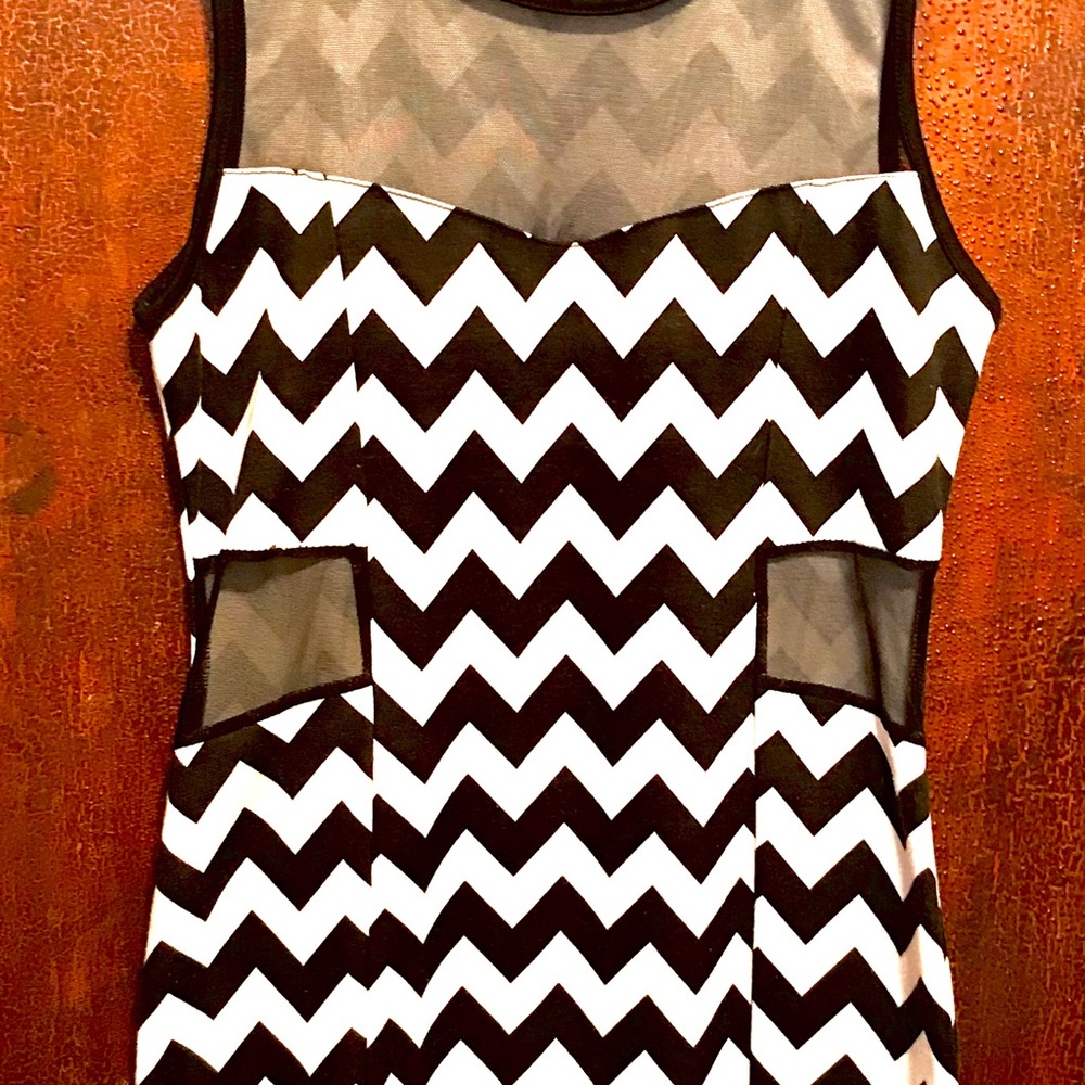 A to the knee dress sleeveless. Very cute